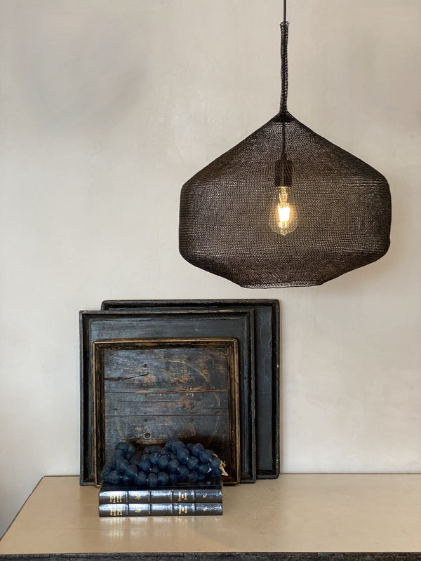 Modern braided metal pendant light in black, shop the entire collection in store or online 