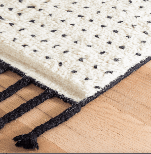 Speck Black Hand Knotted Wool Rug with Tassels